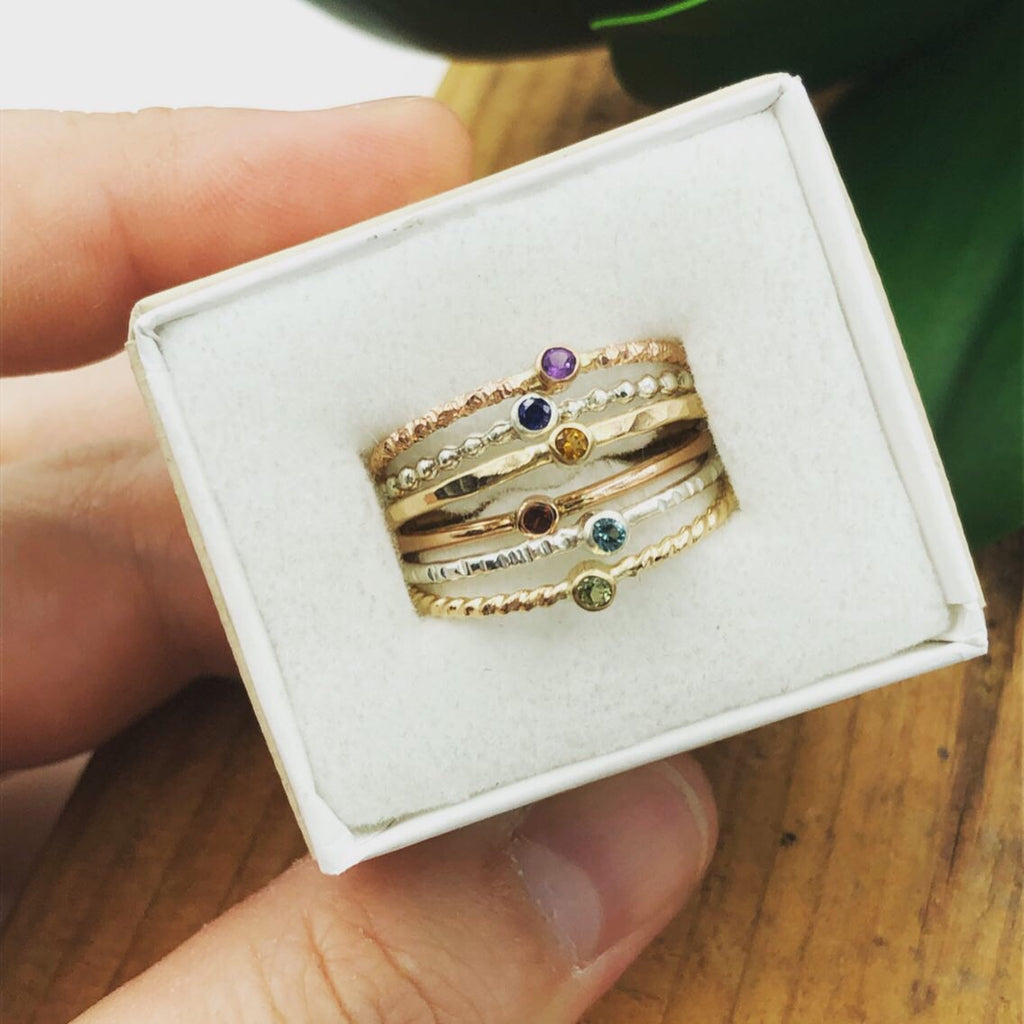 tiny stacking rings in ring box