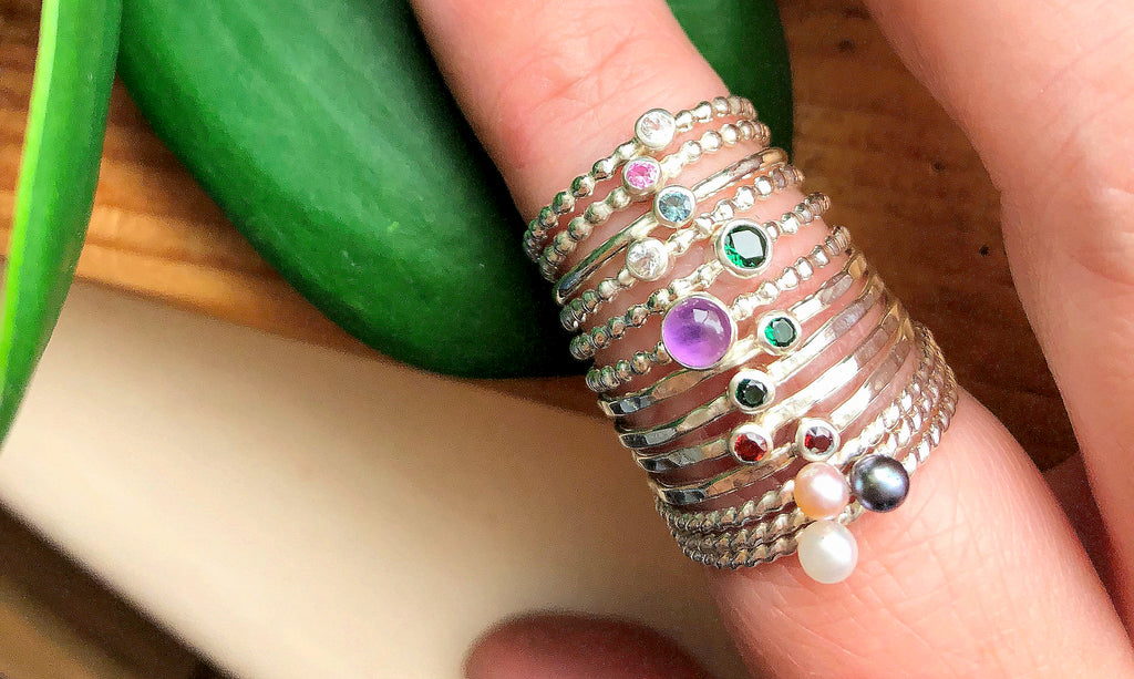 pearl and birthstone stacking rings with different style textured bands sterling silver